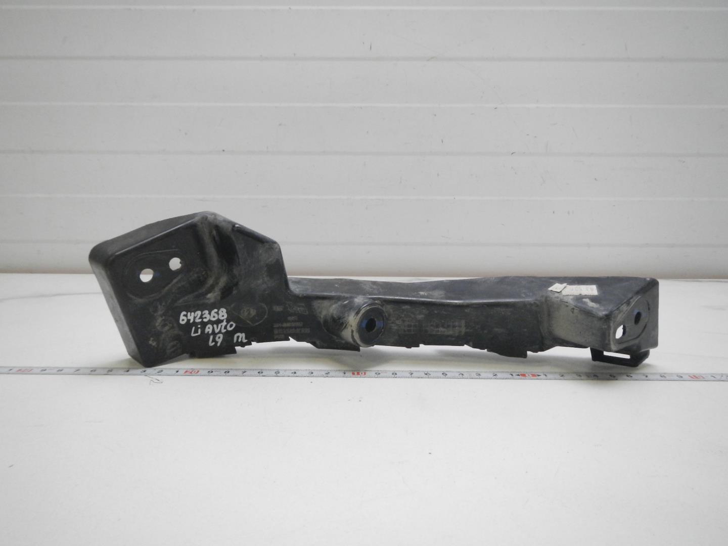 Кронштейн переднего бампера левый