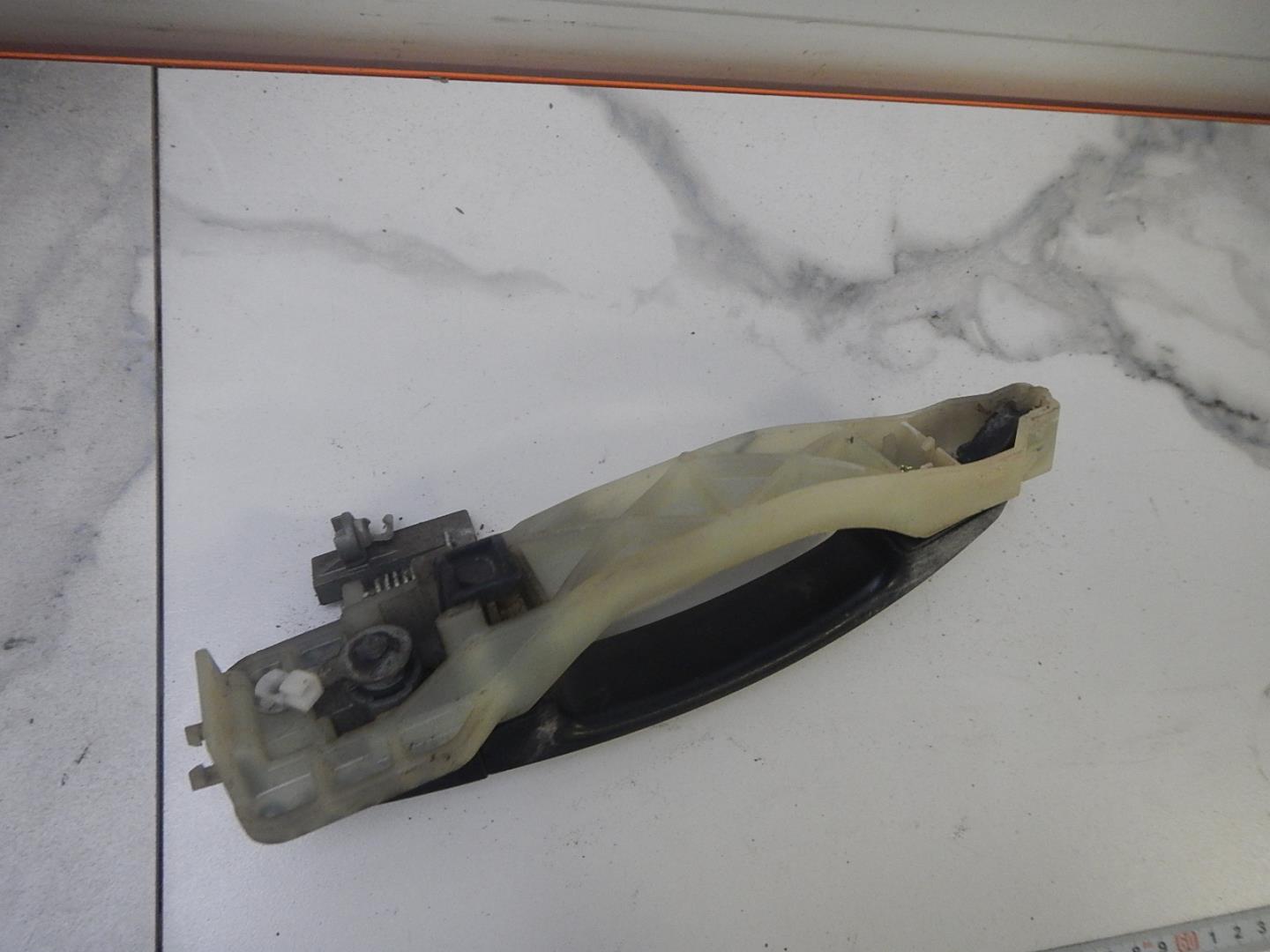 Ручка двери передней наружная левая