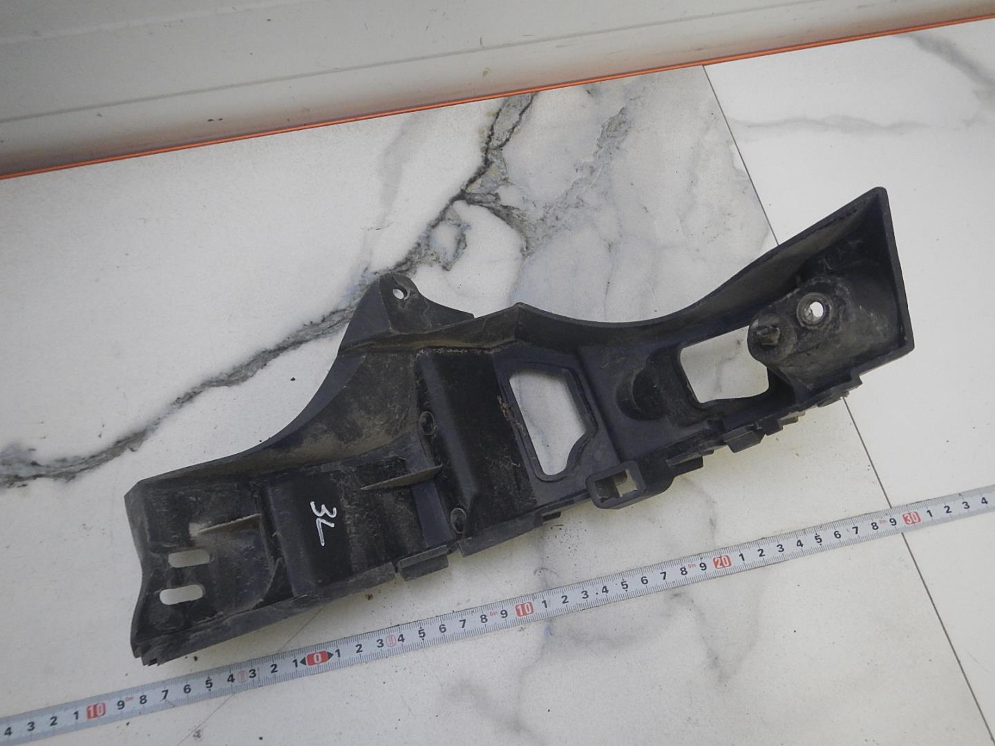 Кронштейн заднего бампера левый