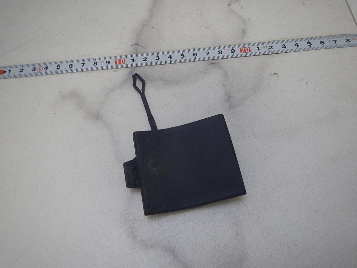 Заглушка буксировочного крюка