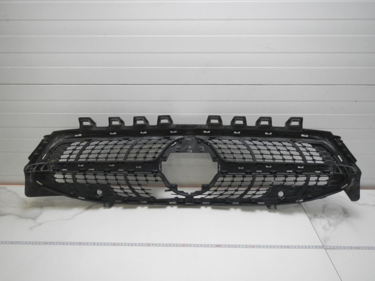 Кронштейн решетки радиатора