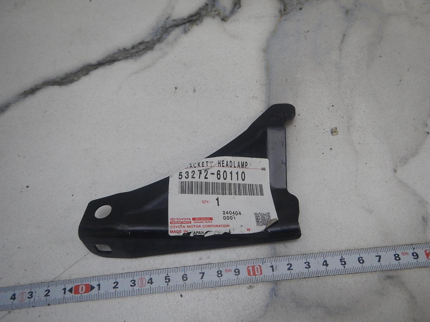 Кронштейн фар левый