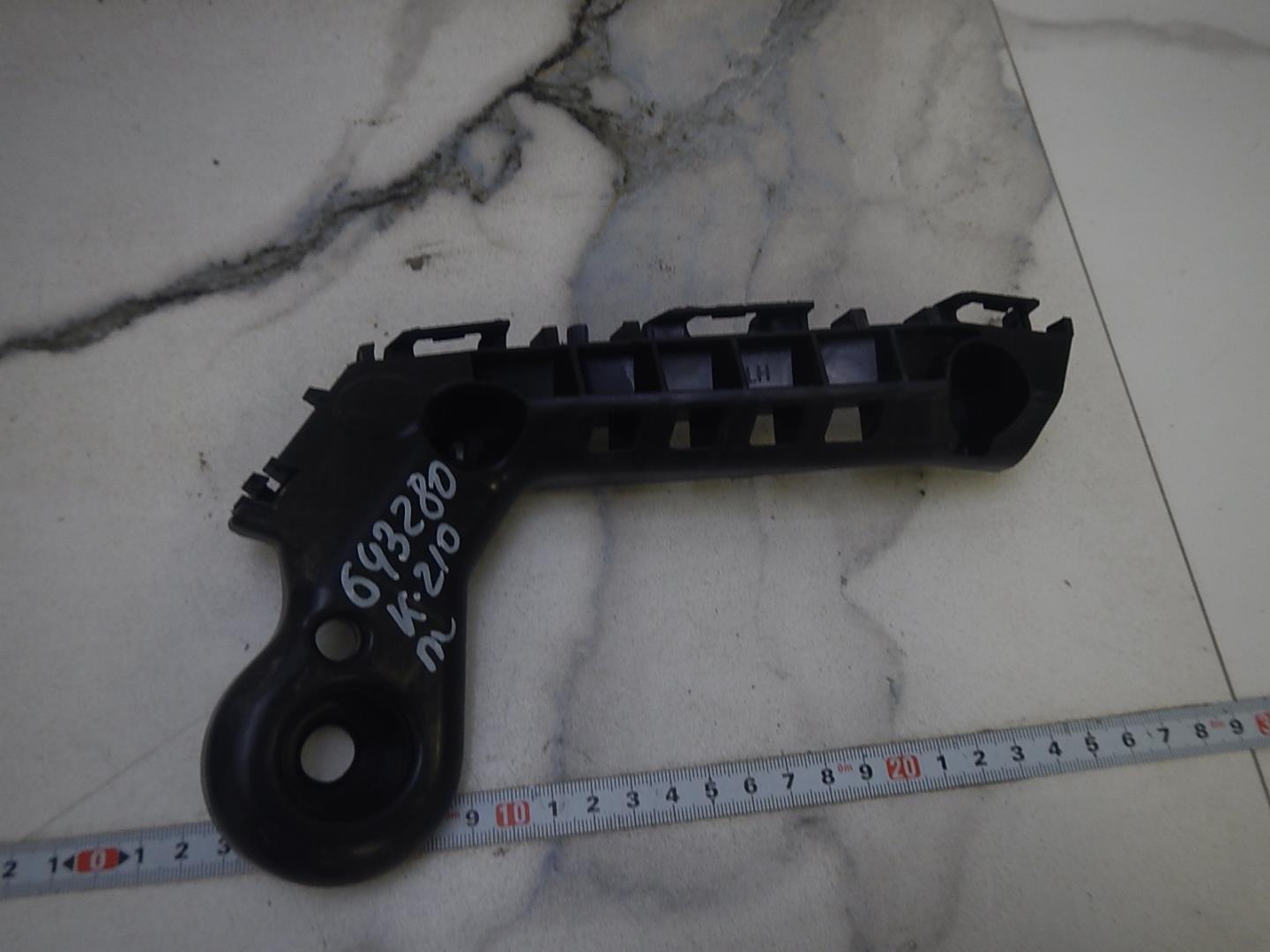 Кронштейн переднего бампера левый