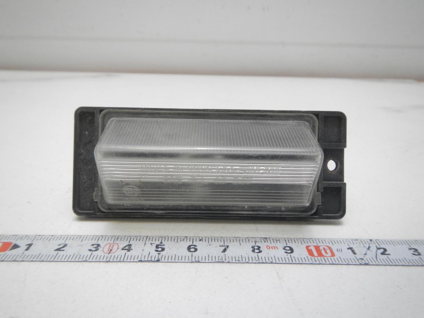 Фонарь подсветки номера