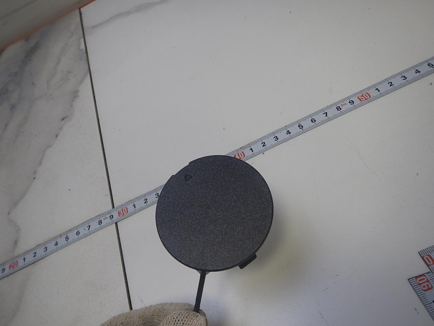 Заглушка буксировочного крюка