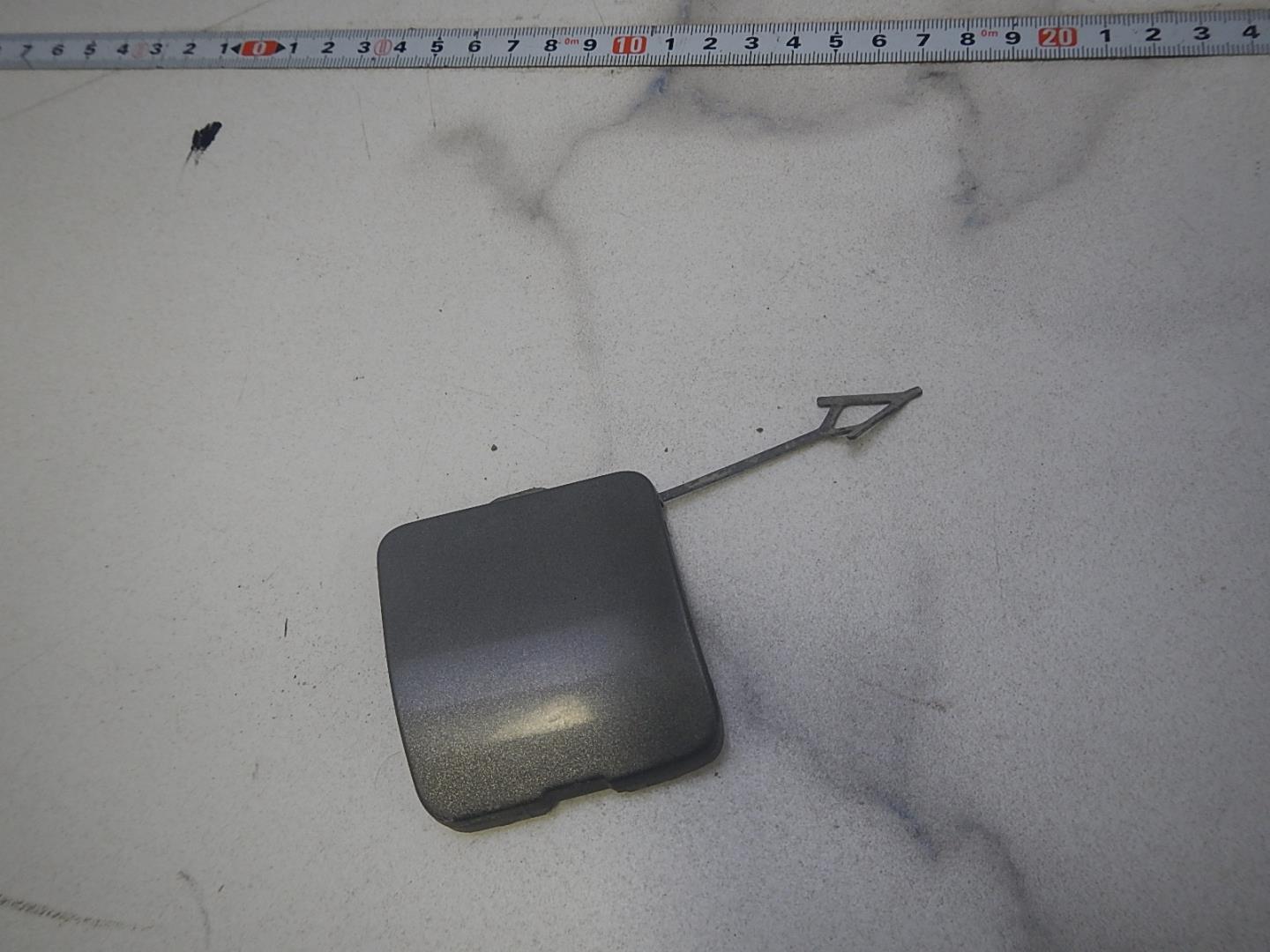 Заглушка буксировочного крюка