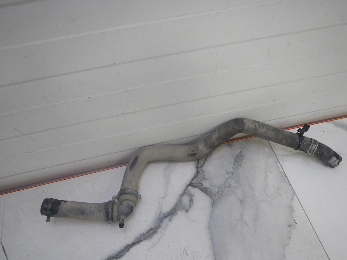 Патрубок отопителя