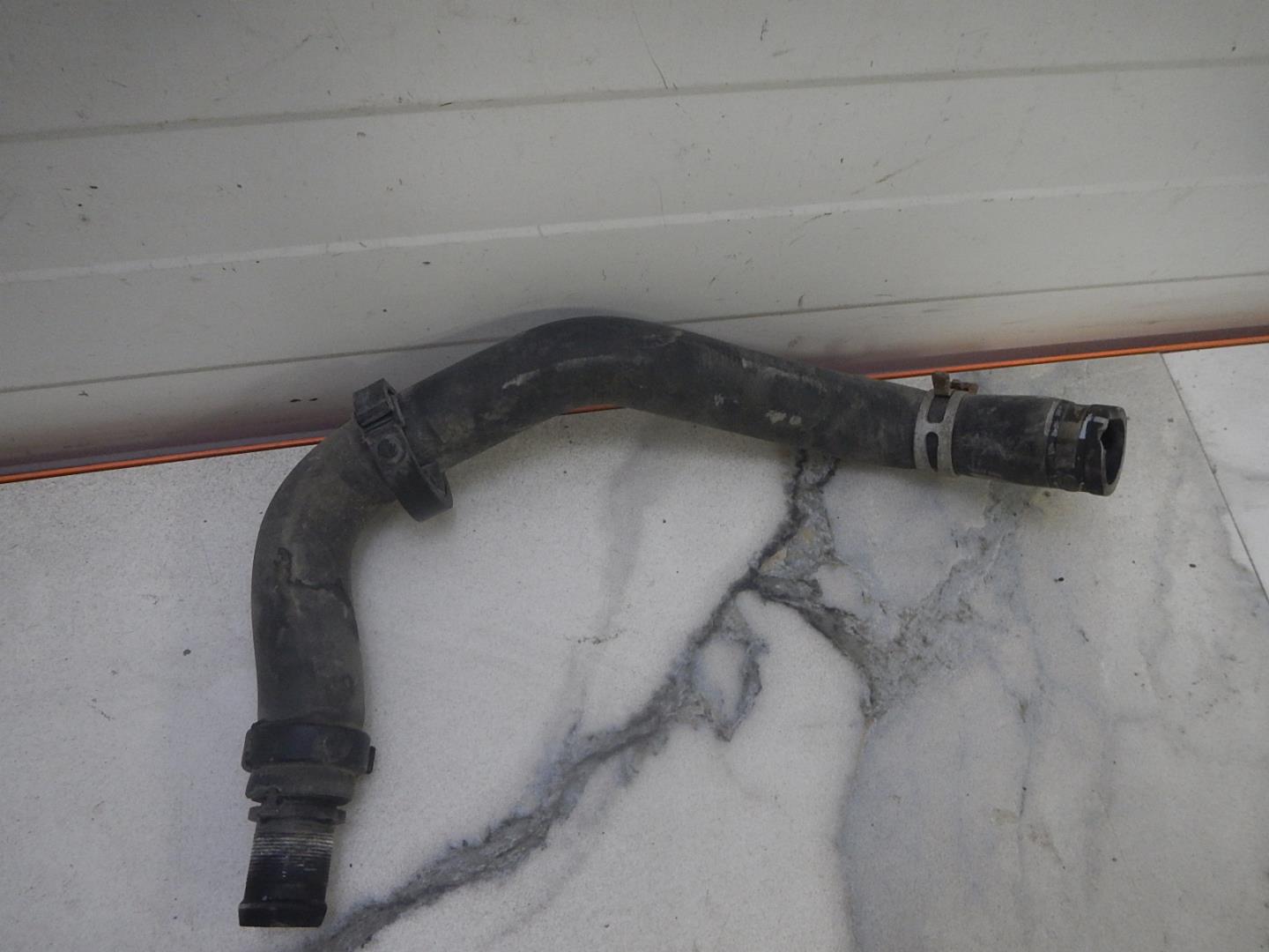 Патрубок отопителя