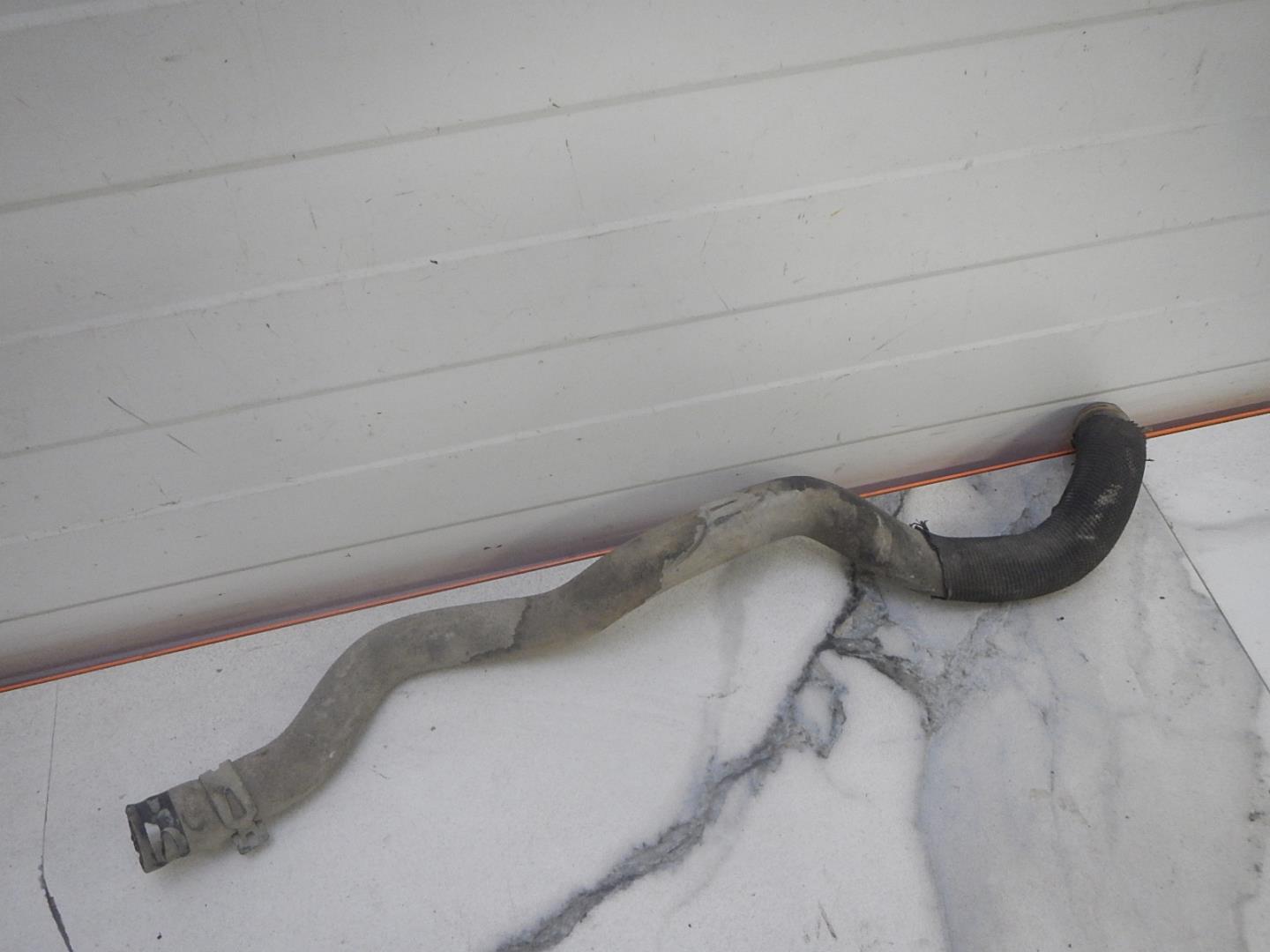 Патрубок отопителя