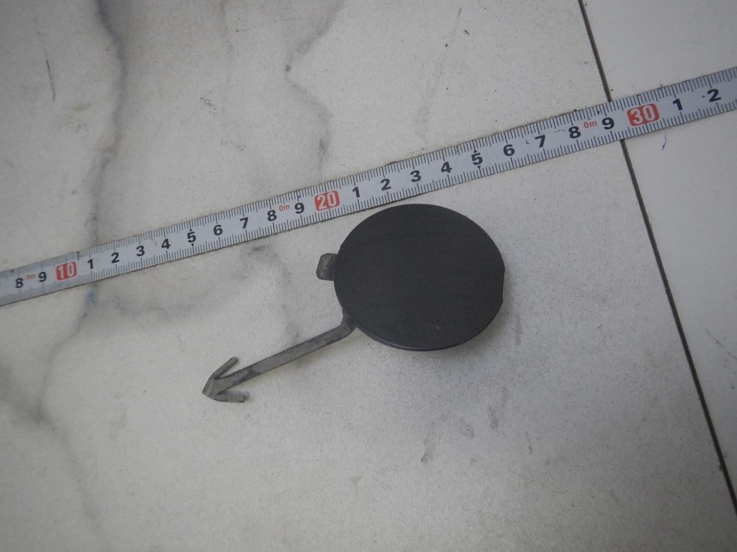 Заглушка буксировочного крюка