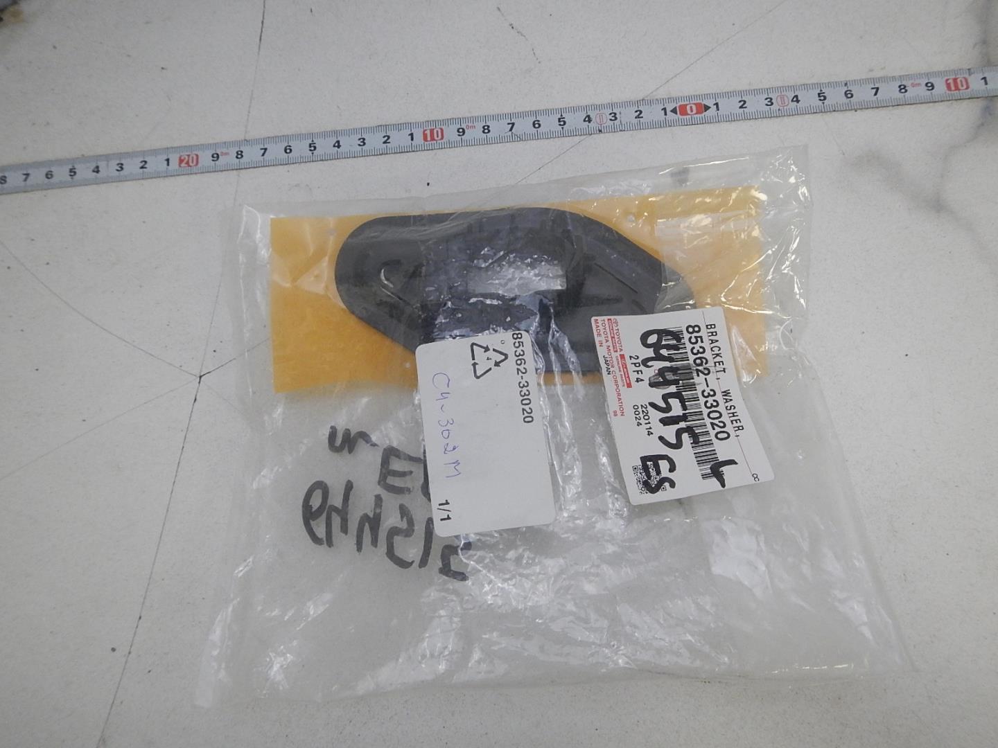 Кронштейн форсунки омывателя фары