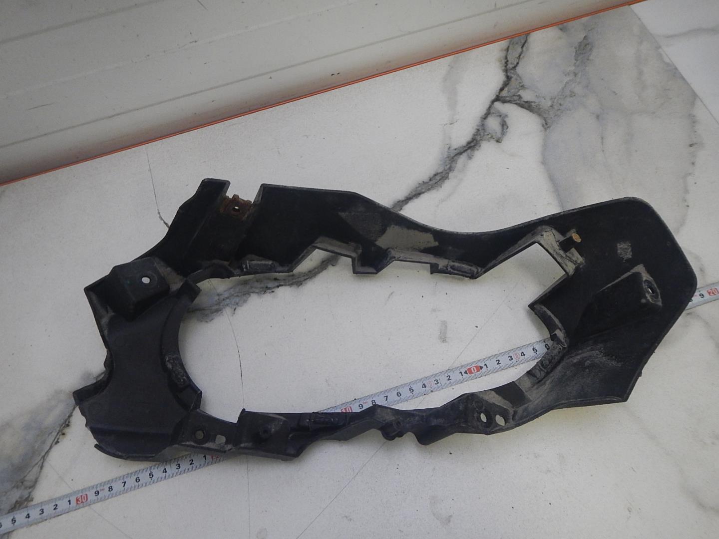 Кронштейн заднего бампера правый