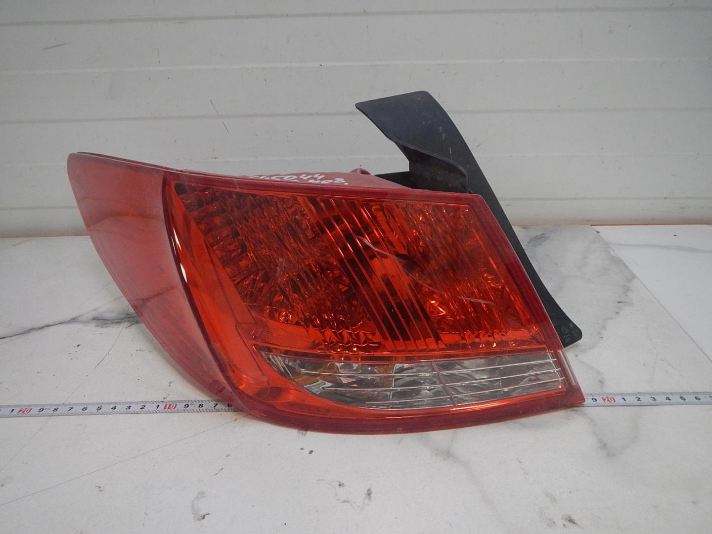 Фонарь задний левый