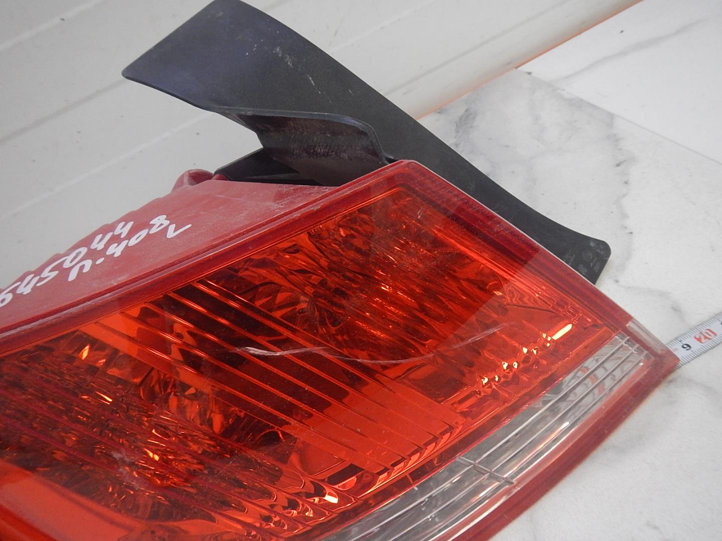 Фонарь задний левый