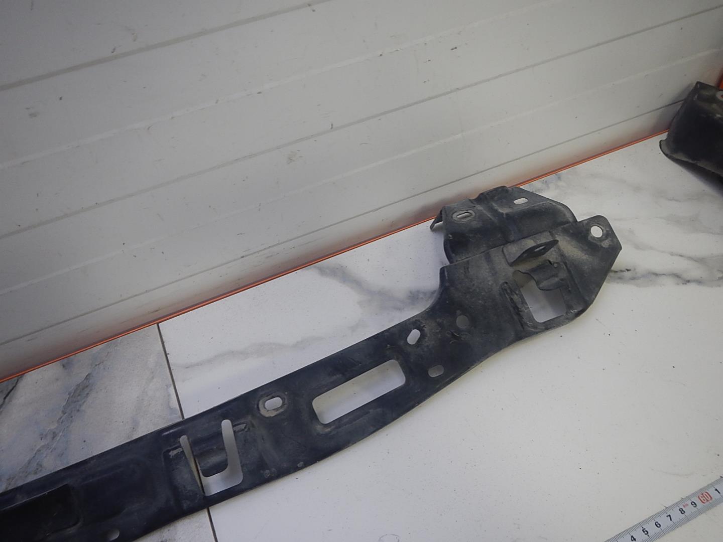 Кронштейн переднего бампера