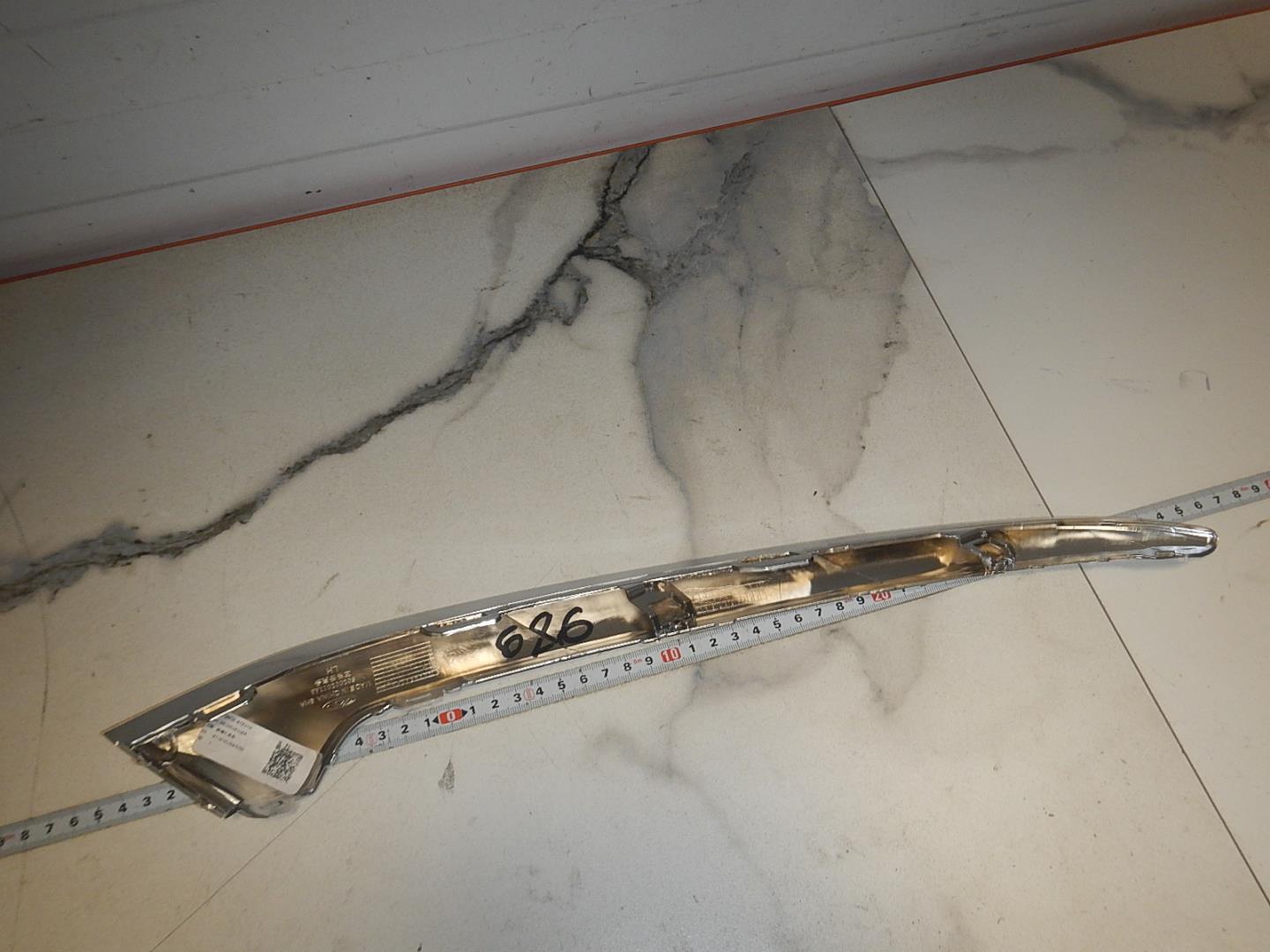 Молдинг переднего бампера левый