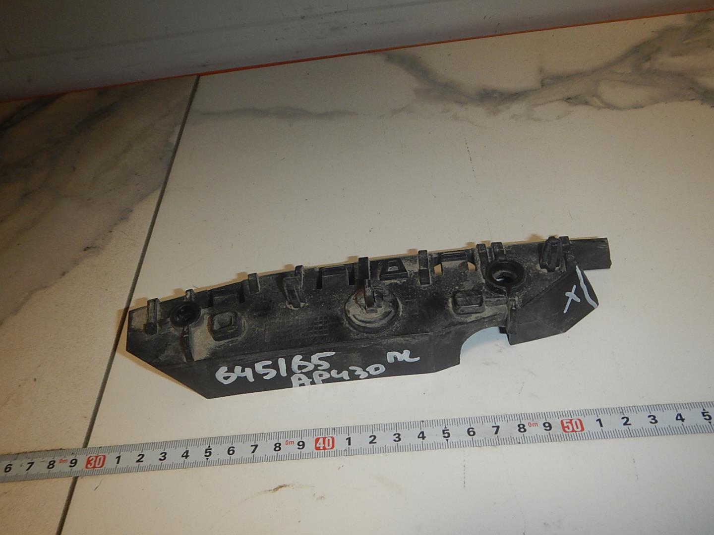 Кронштейн переднего бампера левый