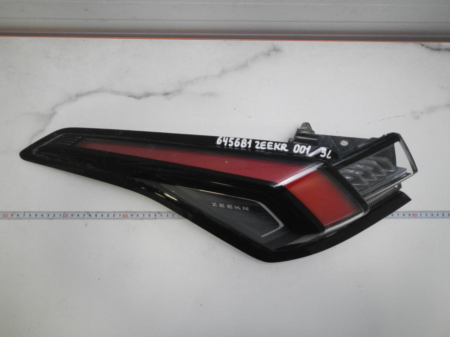 Фонарь задний левый