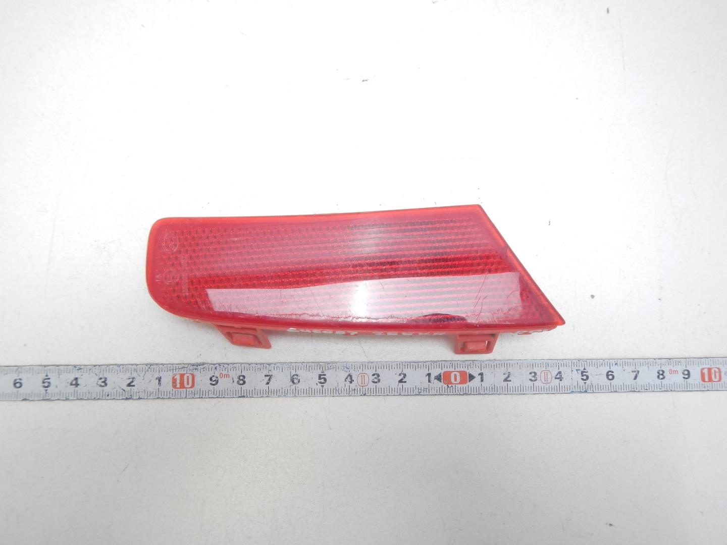 Отражатель в бампер задний левый