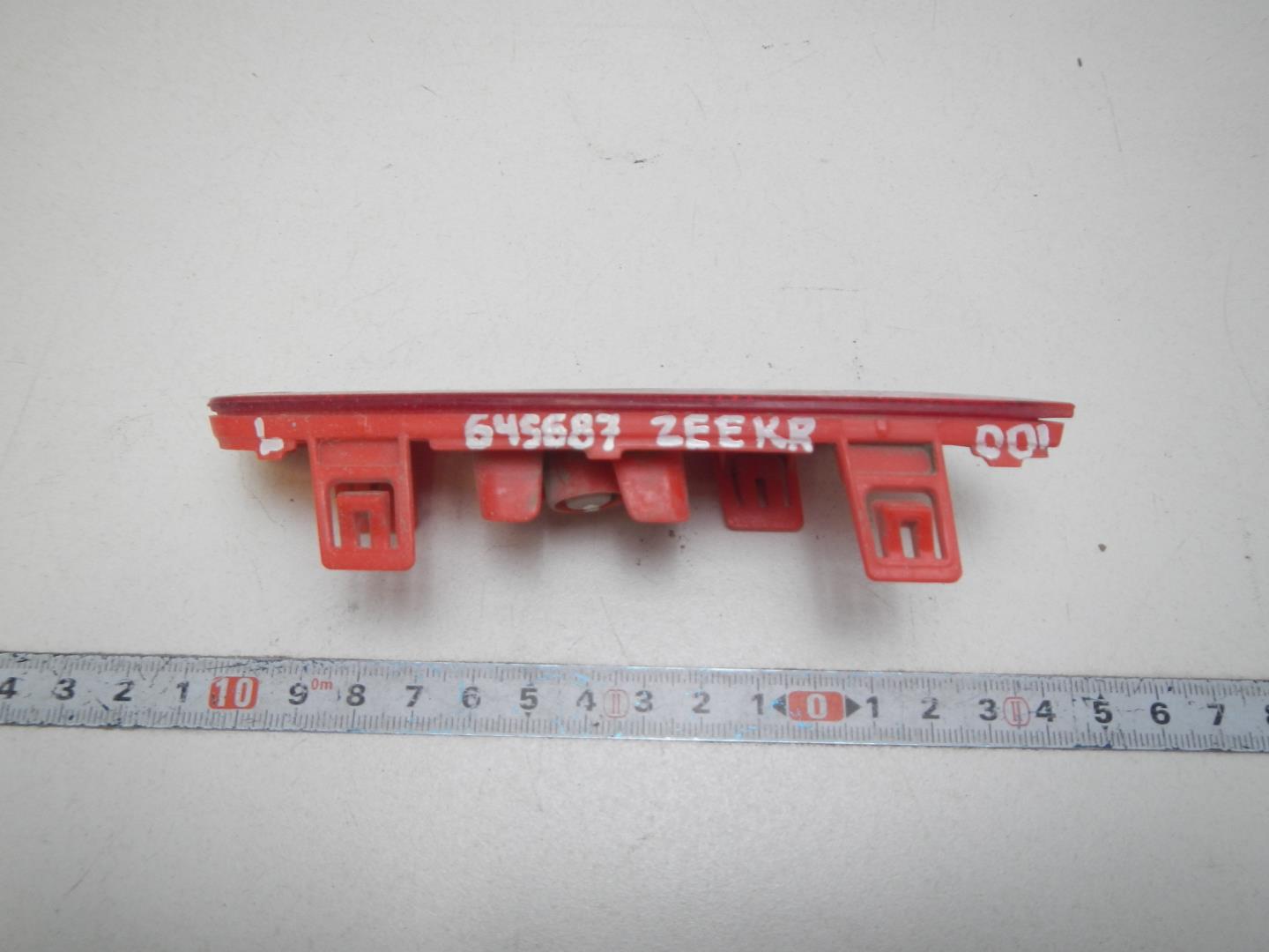 Отражатель в бампер задний левый