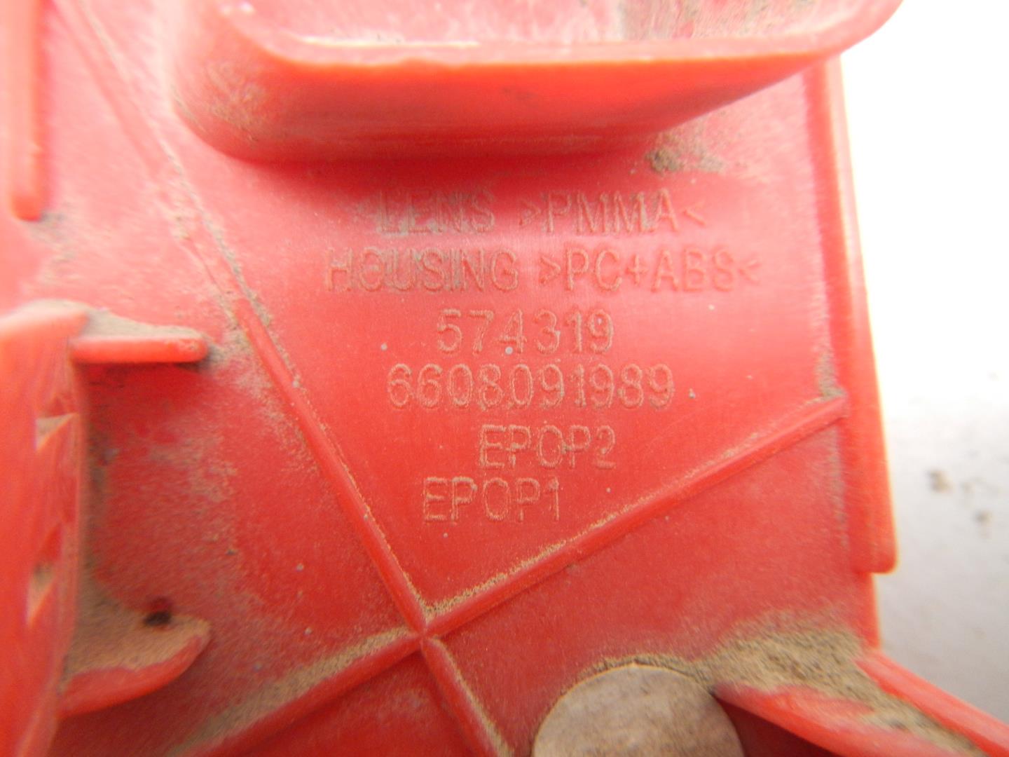 Отражатель в бампер задний левый