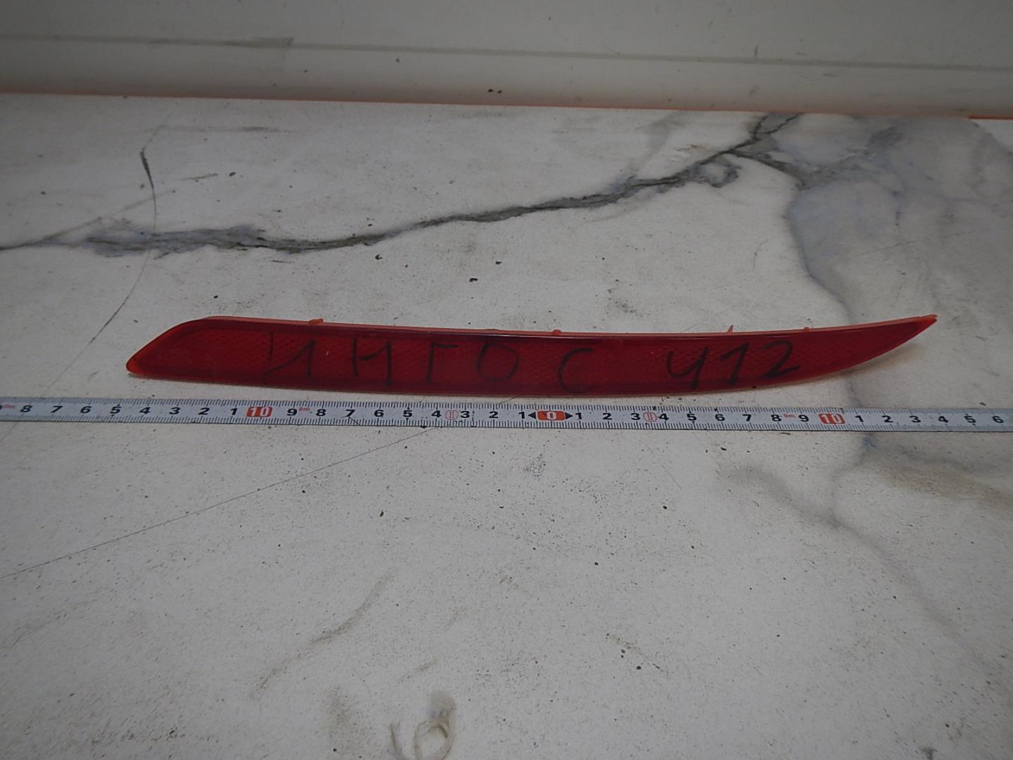 Отражатель в бампер задний левый