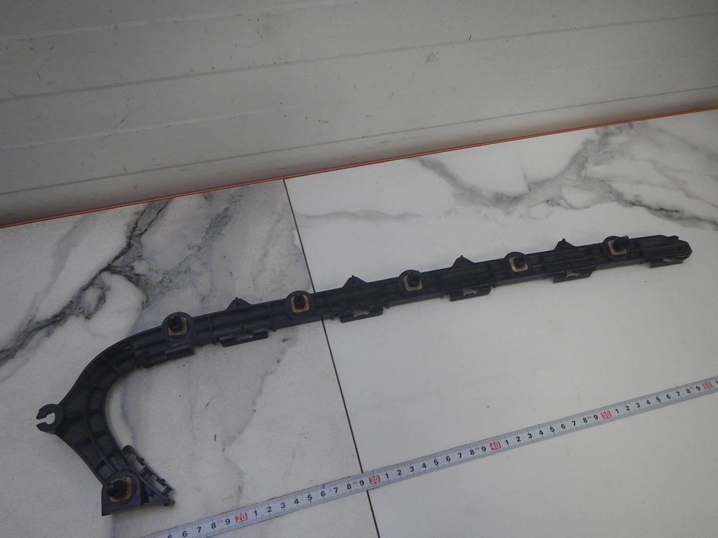 Кронштейн заднего бампера правый