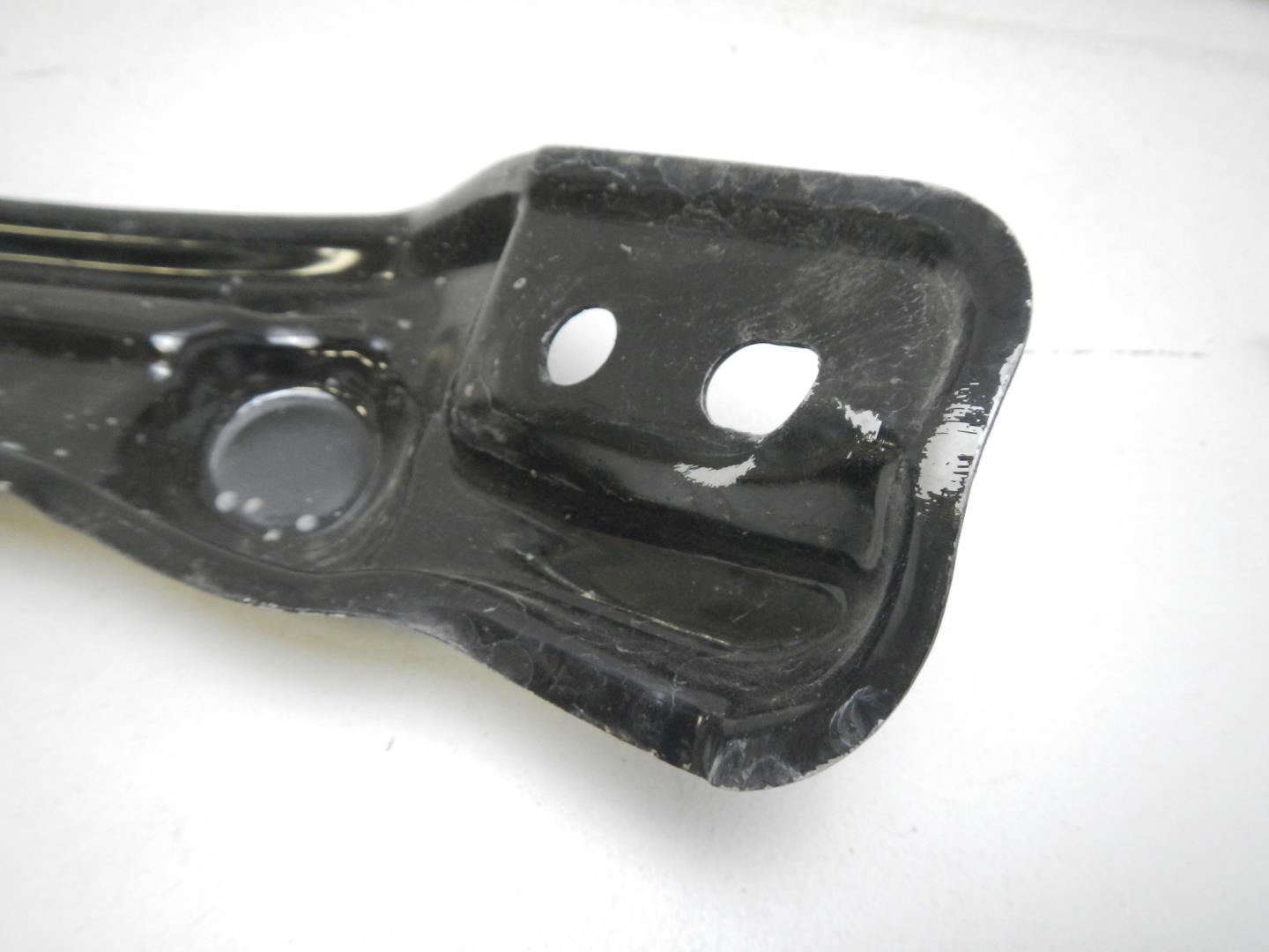 Кронштейн фар левый