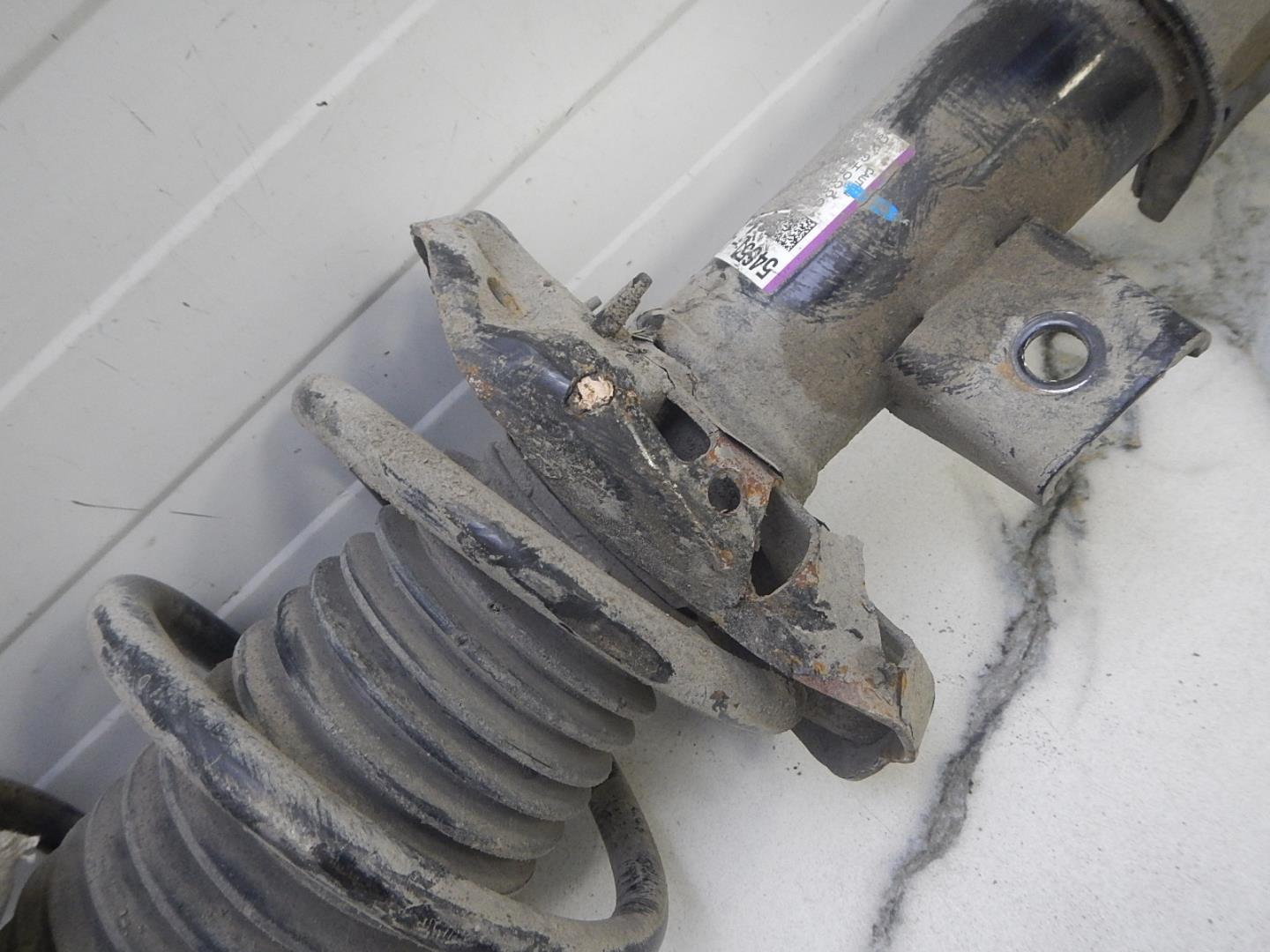 Пружина передняя