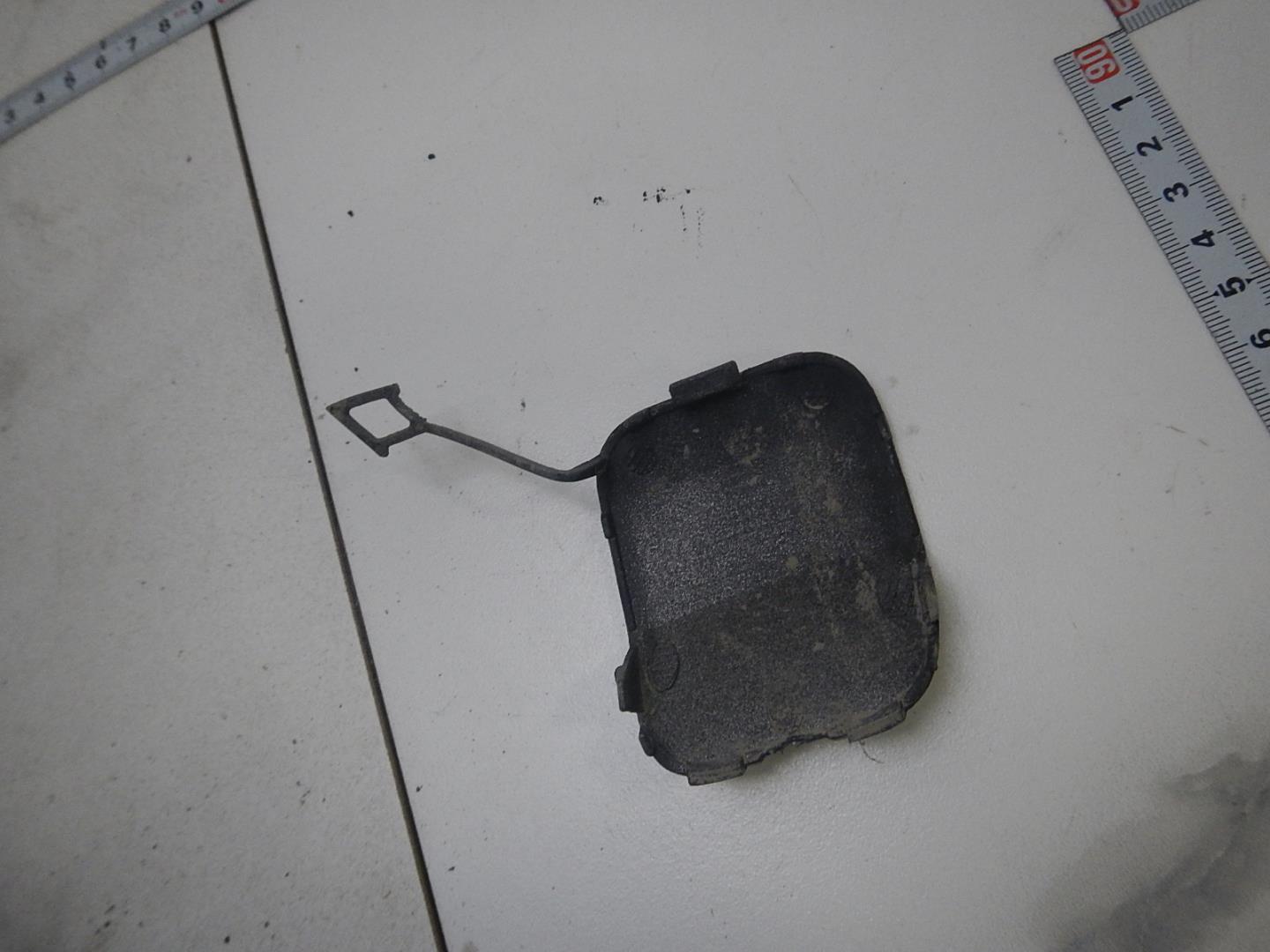 Заглушка буксировочного крюка