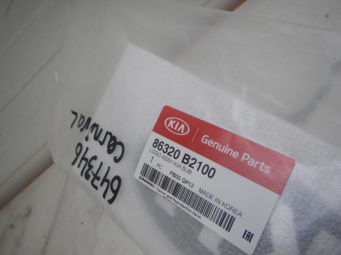 Эмблема на крышку багажника