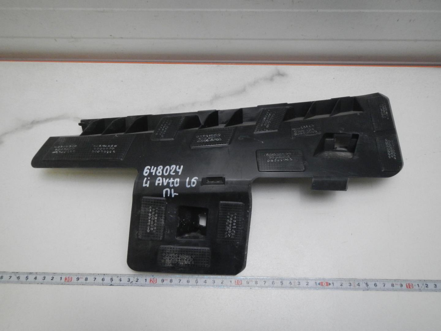 Кронштейн переднего бампера левый