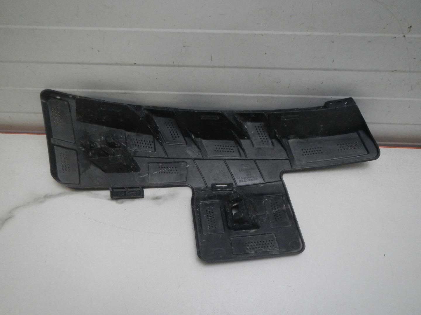 Кронштейн переднего бампера левый