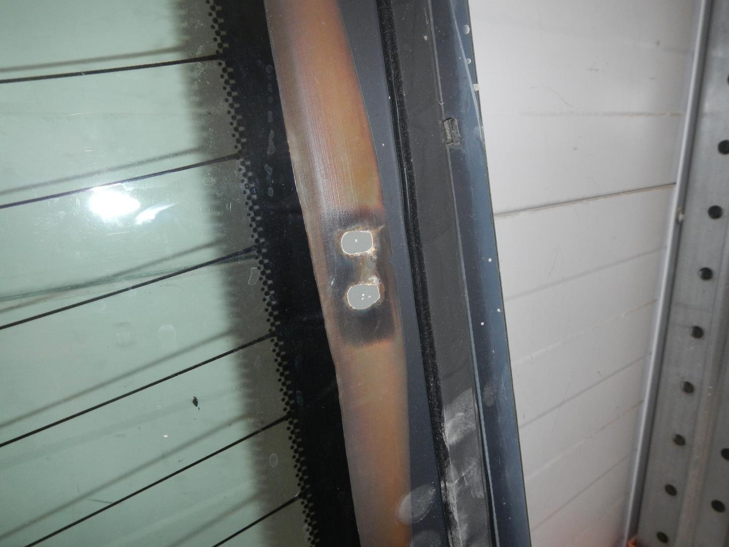 Стекло двери багажника