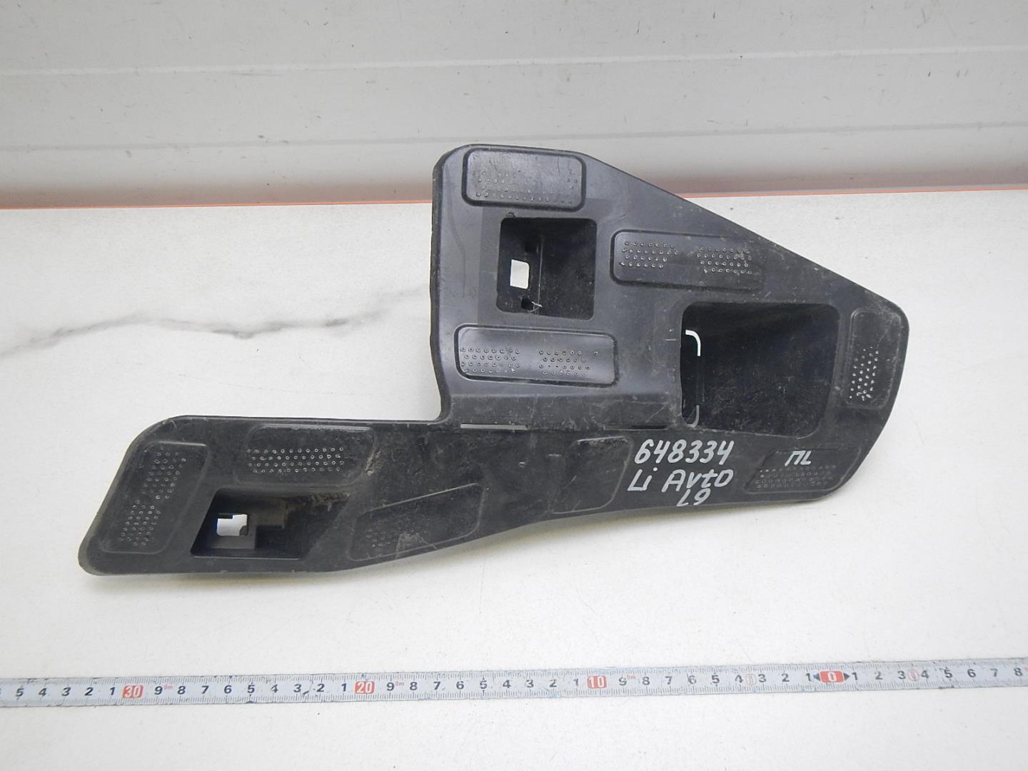 Кронштейн переднего бампера левый