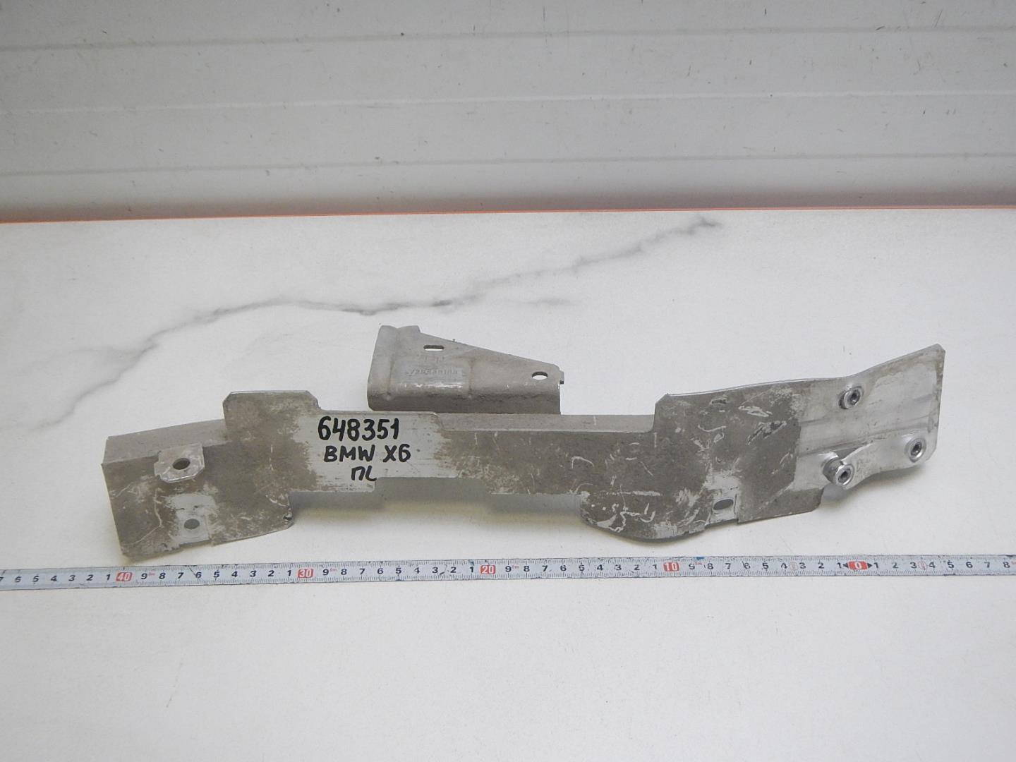 Кронштейн фар левый