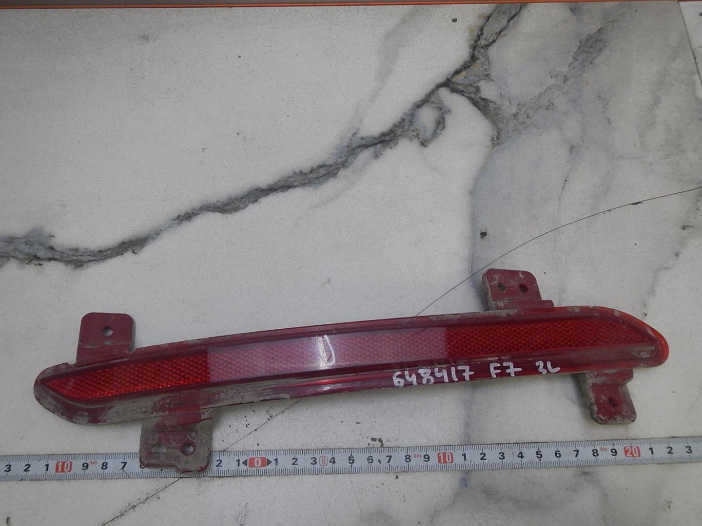 Отражатель в бампер задний левый