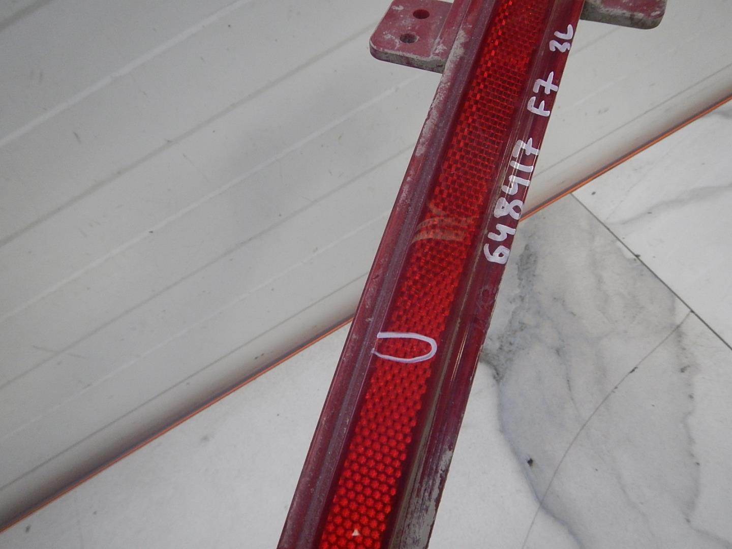 Отражатель в бампер задний левый