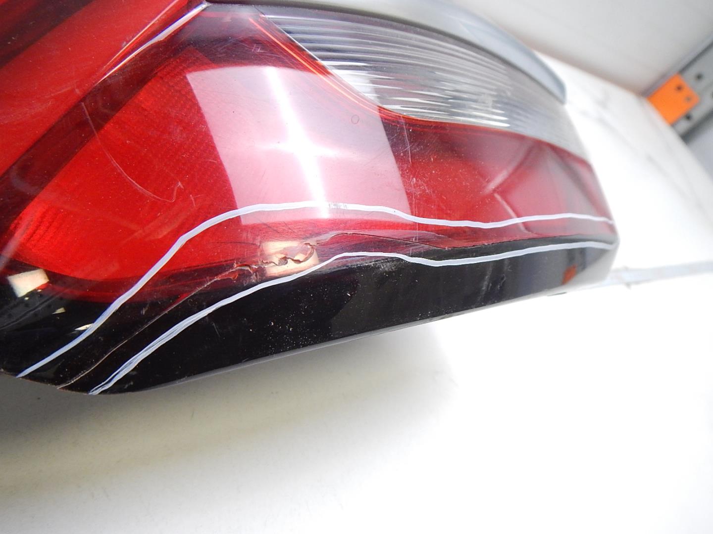 Фонарь задний левый