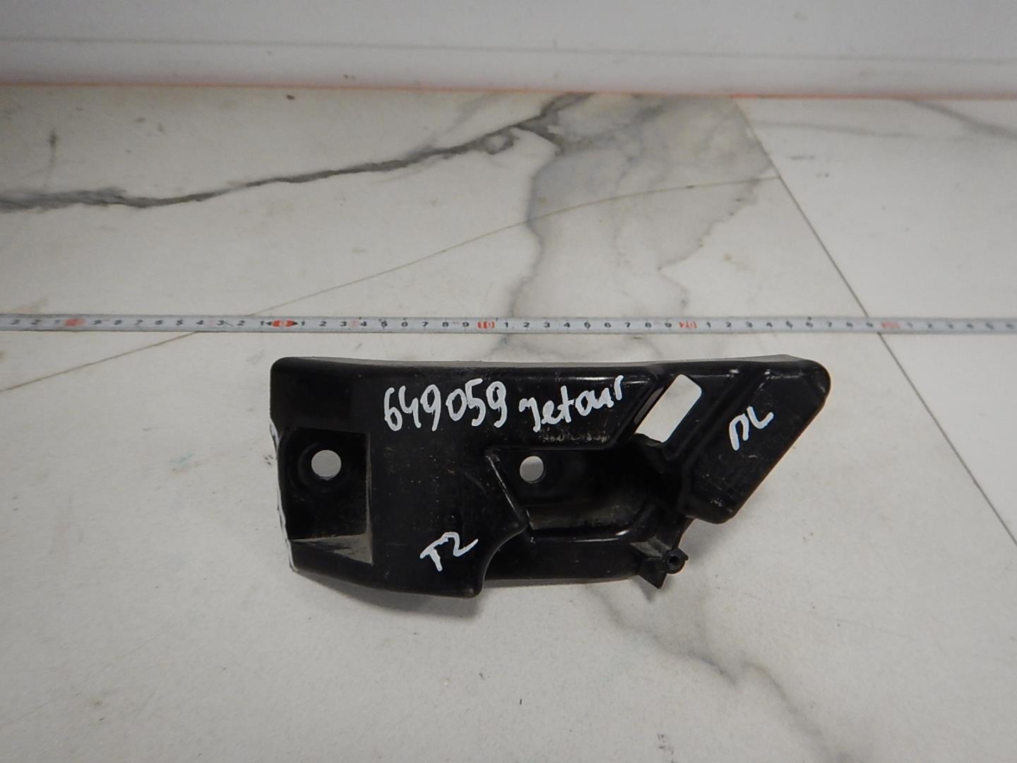 Кронштейн переднего бампера левый