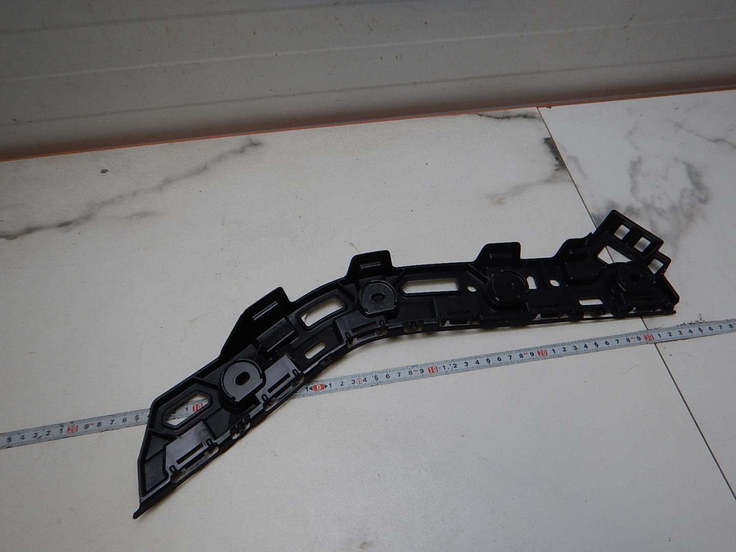 Кронштейн заднего бампера левый