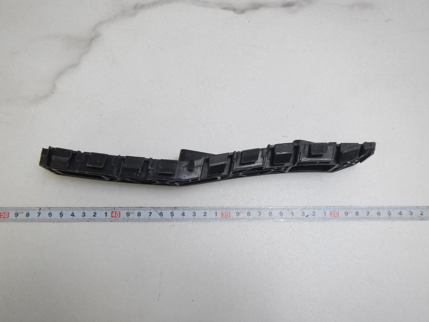 Кронштейн заднего бампера левый