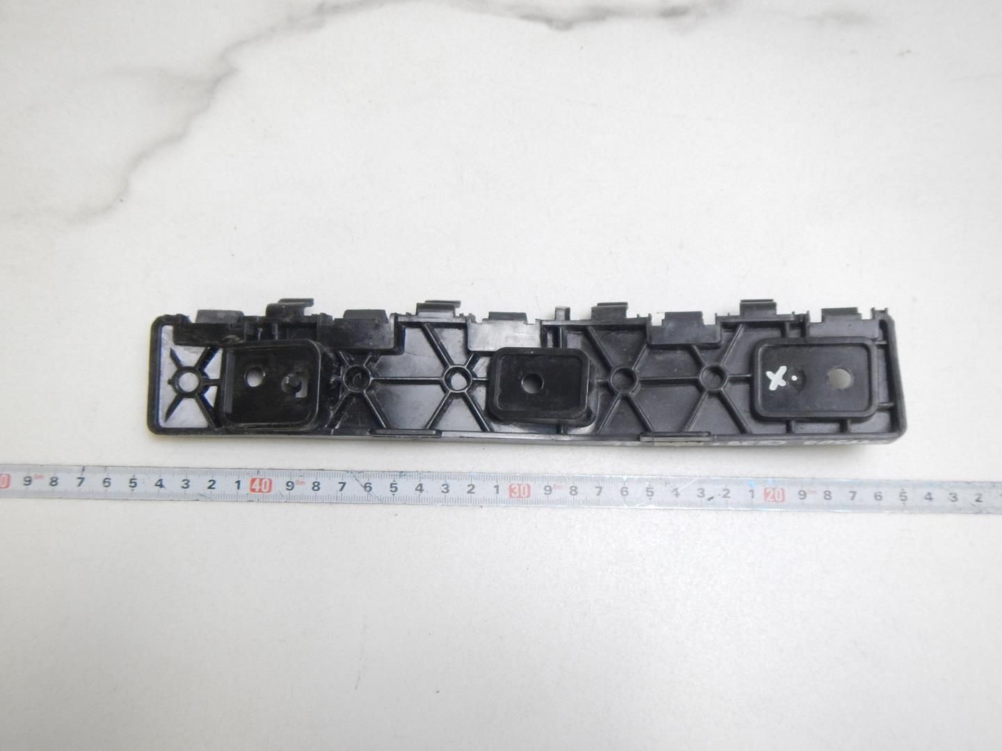 Кронштейн заднего бампера левый