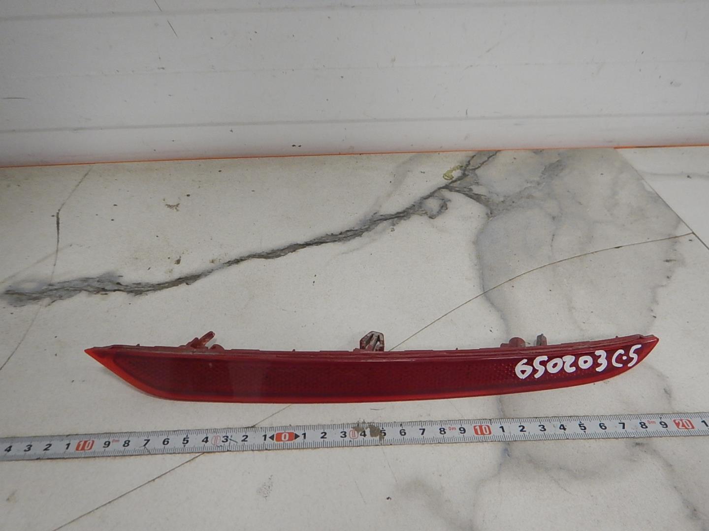 Отражатель в бампер задний левый для C5 (T19C) 2022>