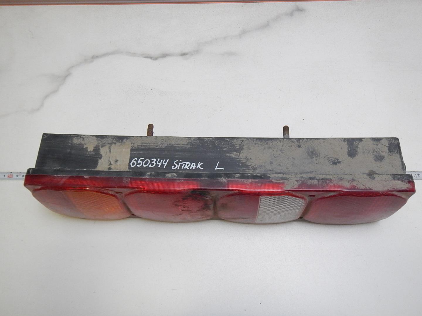 Фонарь задний левый