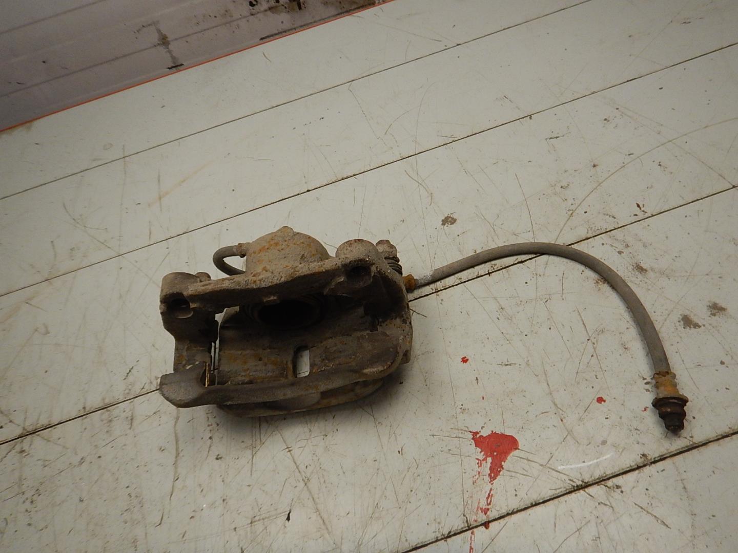 Суппорт передний левый