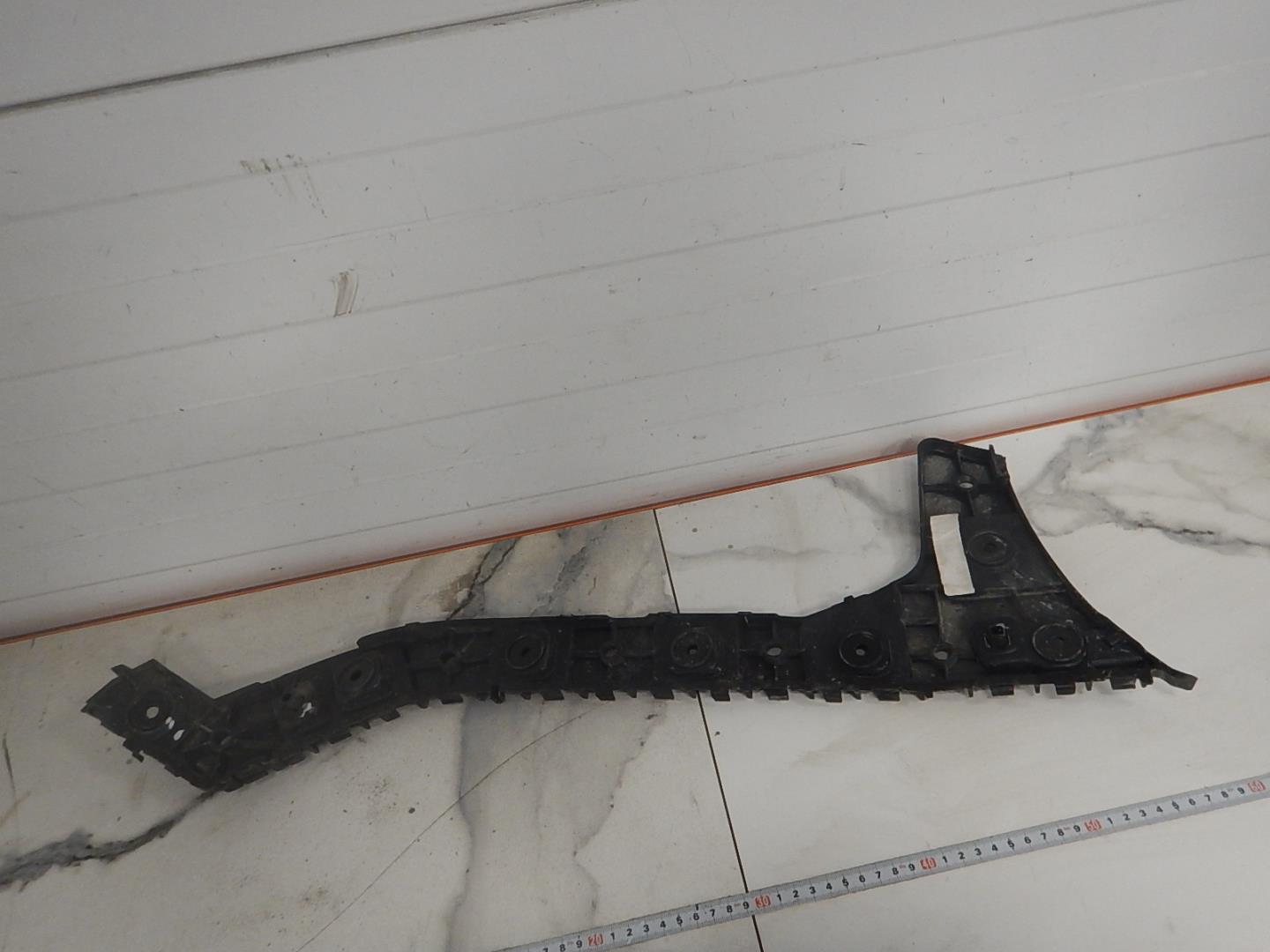 Кронштейн заднего бампера правый