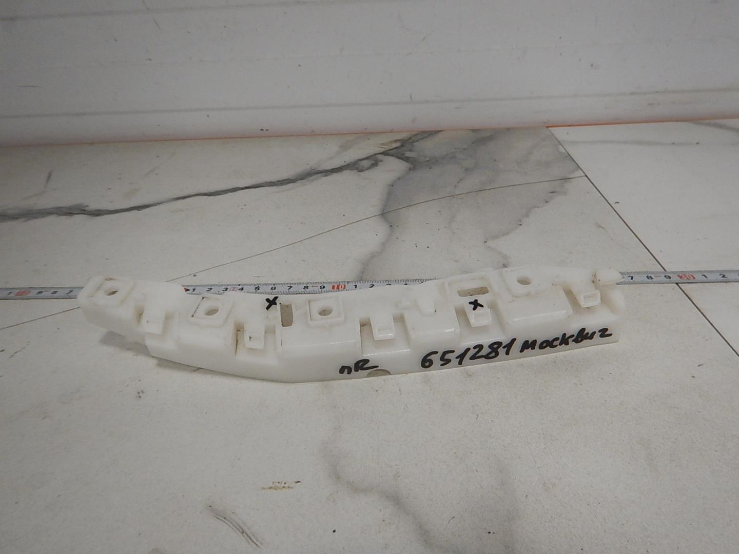 Кронштейн переднего бампера правый