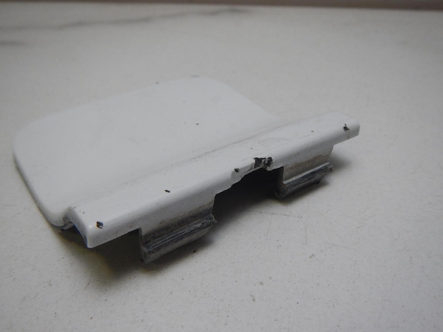 Заглушка буксировочного крюка