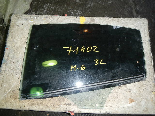 Стекло двери задней левой